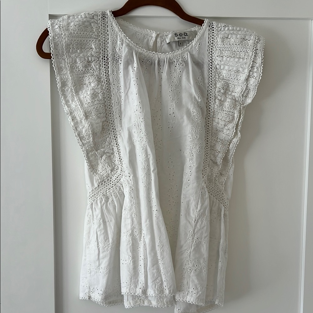 White ruffled blouse in cotton eyelet from Sea New York
